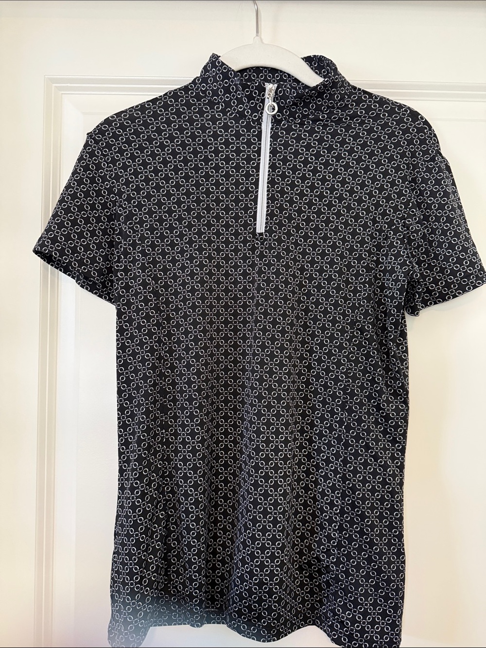 Black Short Sleeve Zip Mock Neck Golf Top with White Circle Print